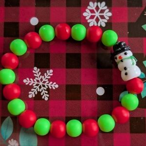 Festive Red and Green Stretch Bracelet with Snowman Charm